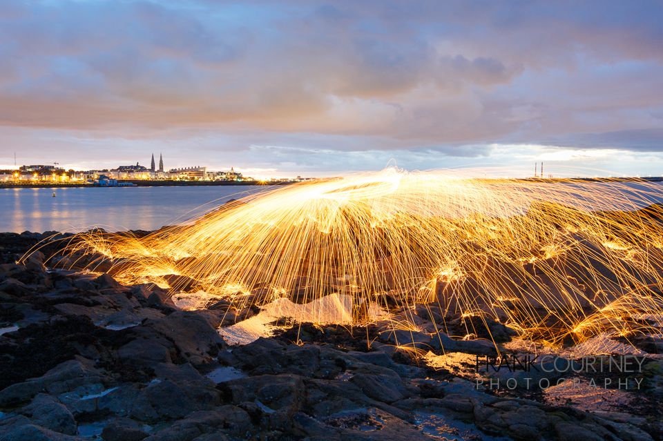 Long exposure photo of steel wool spinning at the Forty Foot in Dun Laoghaire